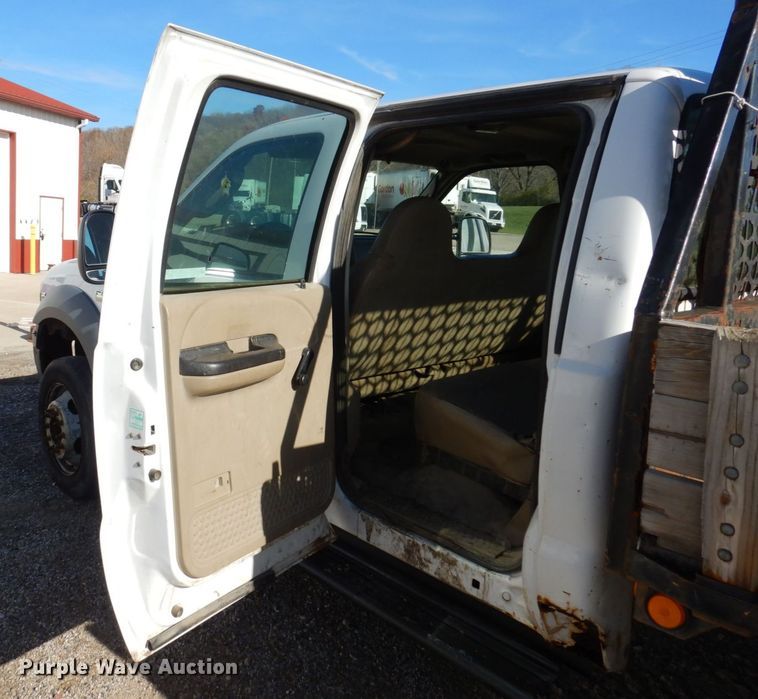 image for item JL9805 2005 Ford F550 Super Duty XL  Crew Cab flatbed truck