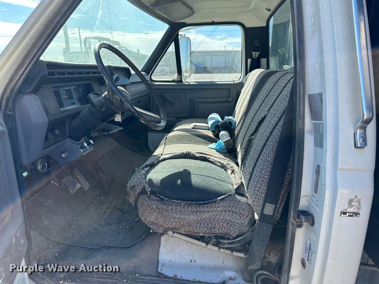 image for item KC9397 1996 Ford F700  vacuum truck