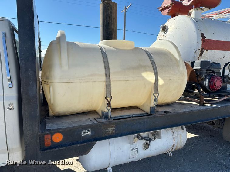 image for item KC9397 1996 Ford F700  vacuum truck