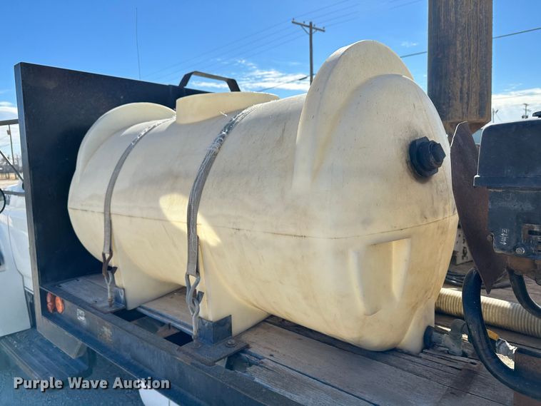 image for item KC9397 1996 Ford F700  vacuum truck