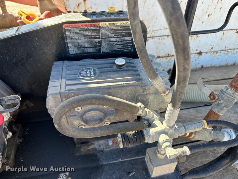 image for item KC9397 1996 Ford F700  vacuum truck