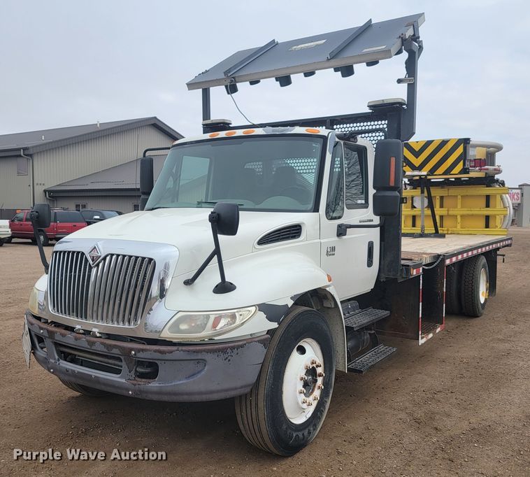 image for item LL9691 2006 International 4300  flatbed truck with crash attenuator