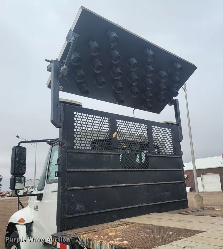 image for item LL9691 2006 International 4300  flatbed truck with crash attenuator