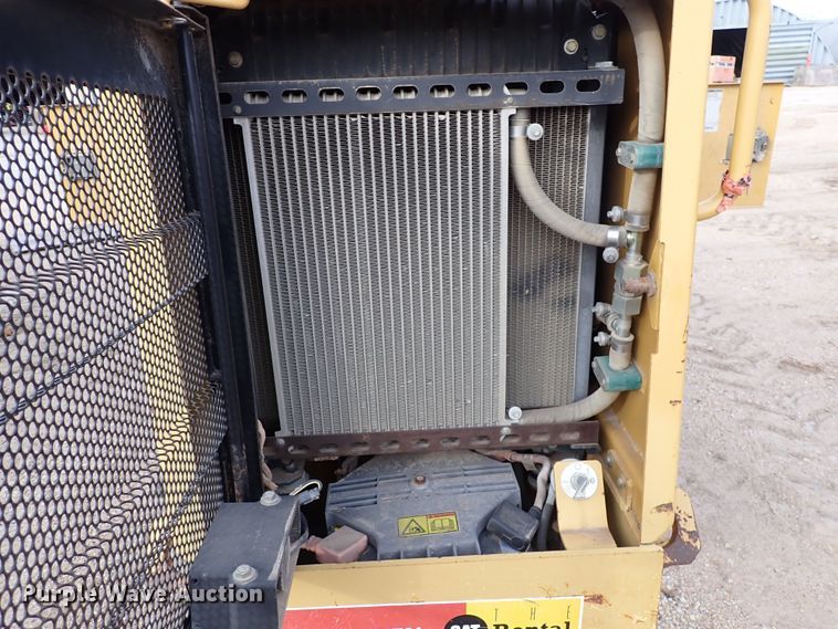 image for item DK1006 2006 Caterpillar CP-323C  single drum roller