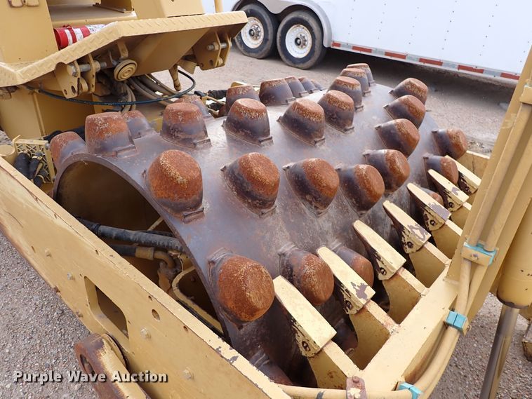 image for item DK1006 2006 Caterpillar CP-323C  single drum roller