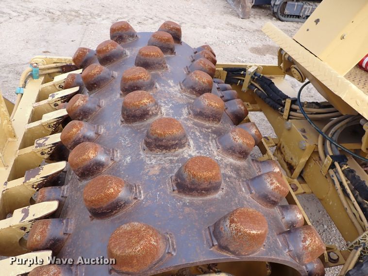 image for item DK1006 2006 Caterpillar CP-323C  single drum roller