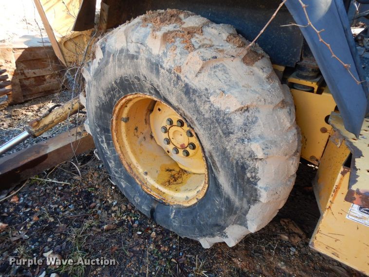 image for item HG9292 1999 John Deere 310E  backhoe