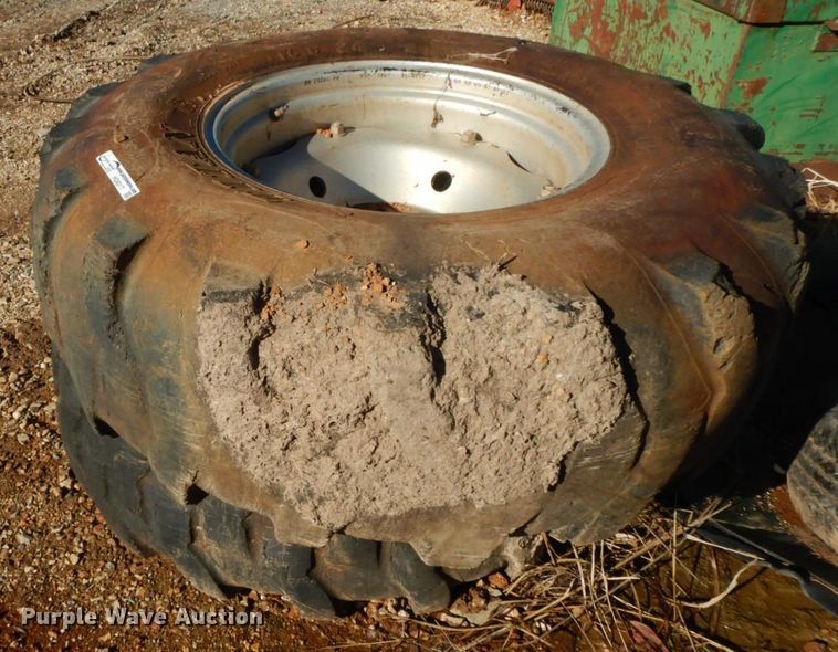 image for item HG9317 (2) 16.9-24 tires and wheels