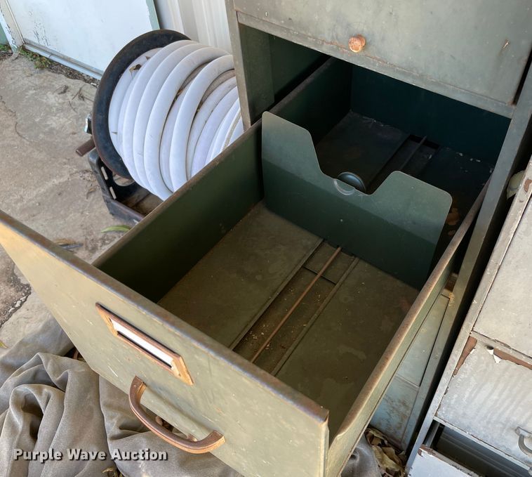 image for item MR9525 (2) four drawer filing cabinets