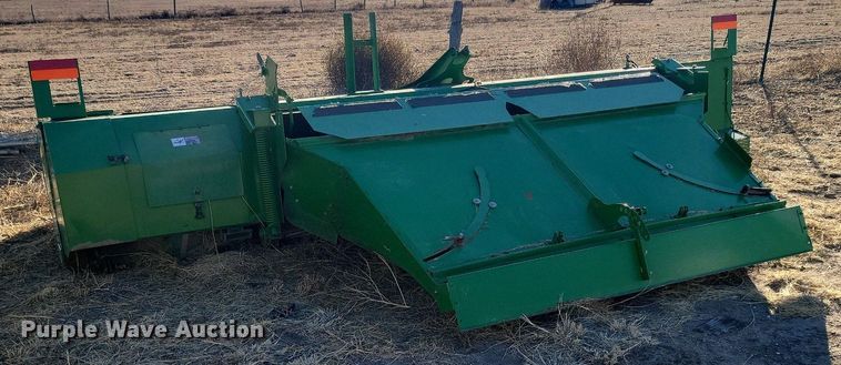 image for item IU9905 2011 John Deere 995  windrower disc head