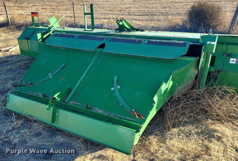 image for item IU9905 2011 John Deere 995  windrower disc head