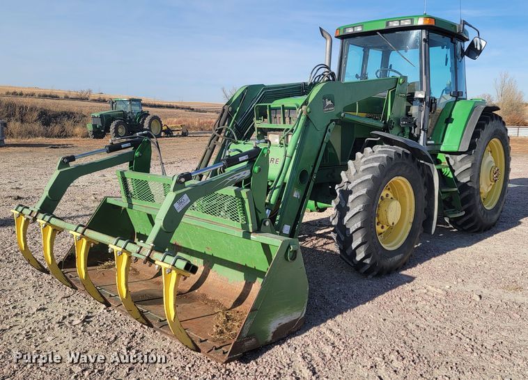 image for item ME9589 1997 John Deere 7410  MFWD tractor