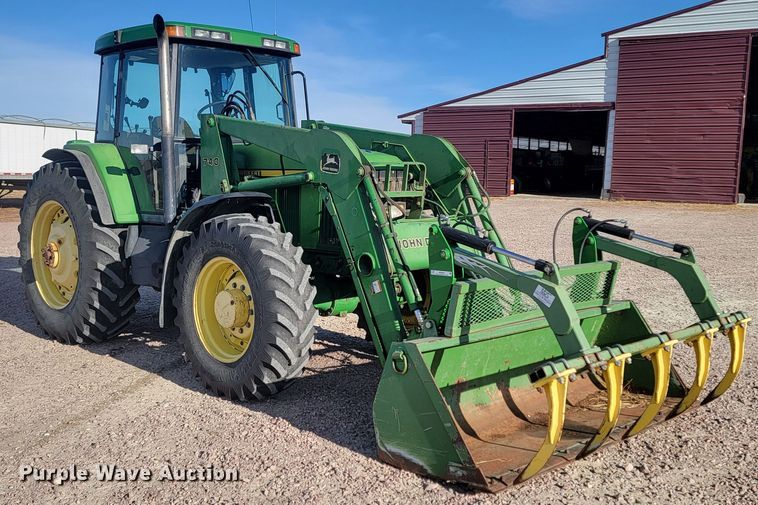 image for item ME9589 1997 John Deere 7410  MFWD tractor
