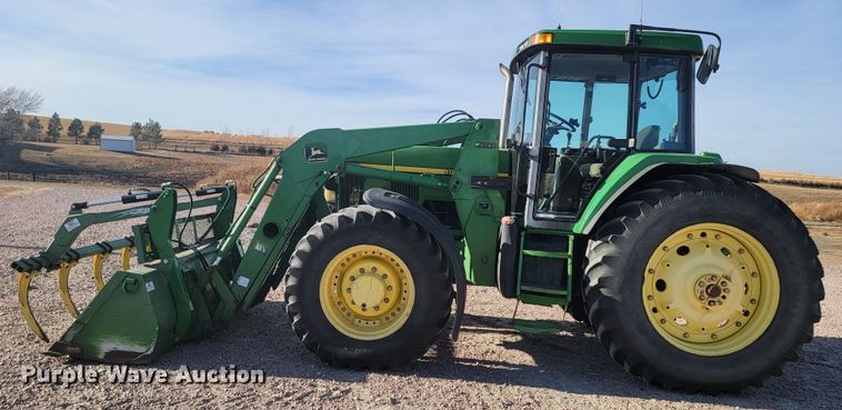 image for item ME9589 1997 John Deere 7410  MFWD tractor
