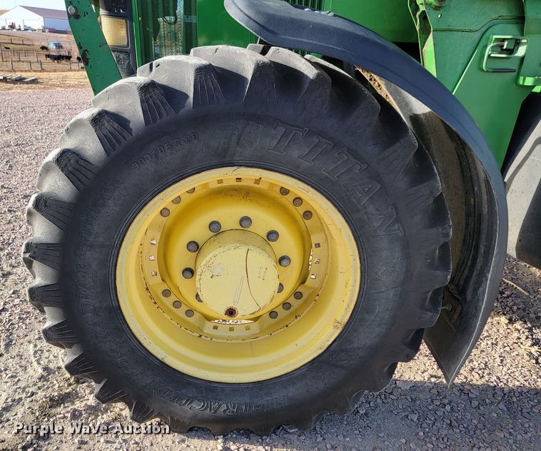 image for item ME9589 1997 John Deere 7410  MFWD tractor