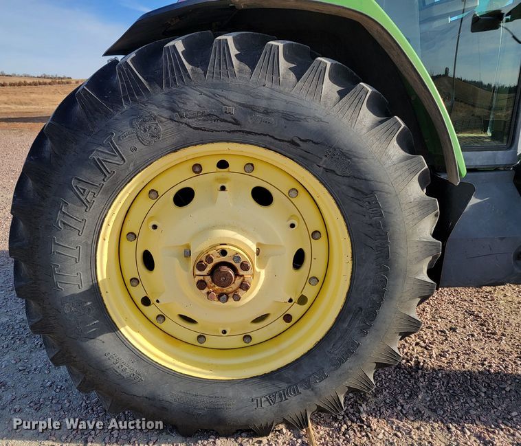 image for item ME9589 1997 John Deere 7410  MFWD tractor