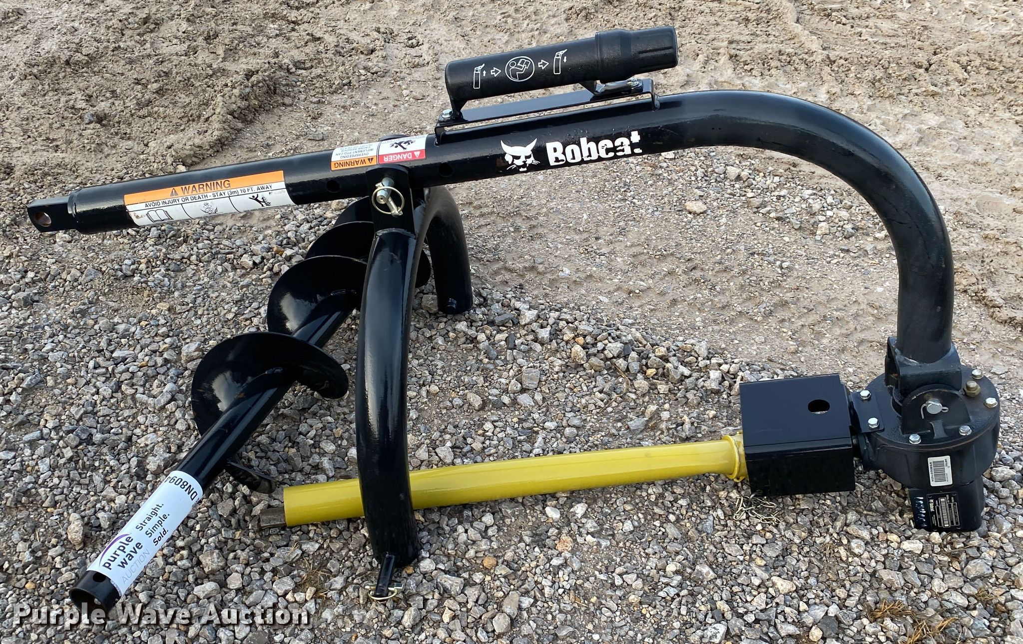 Bobcat FM60 post hole auger in Tulsa, OK Item DN8094 sold Purple Wave