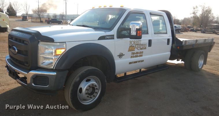 image for item DI6893 2015 Ford F550 Super Duty XL  Crew Cab flatbed truck