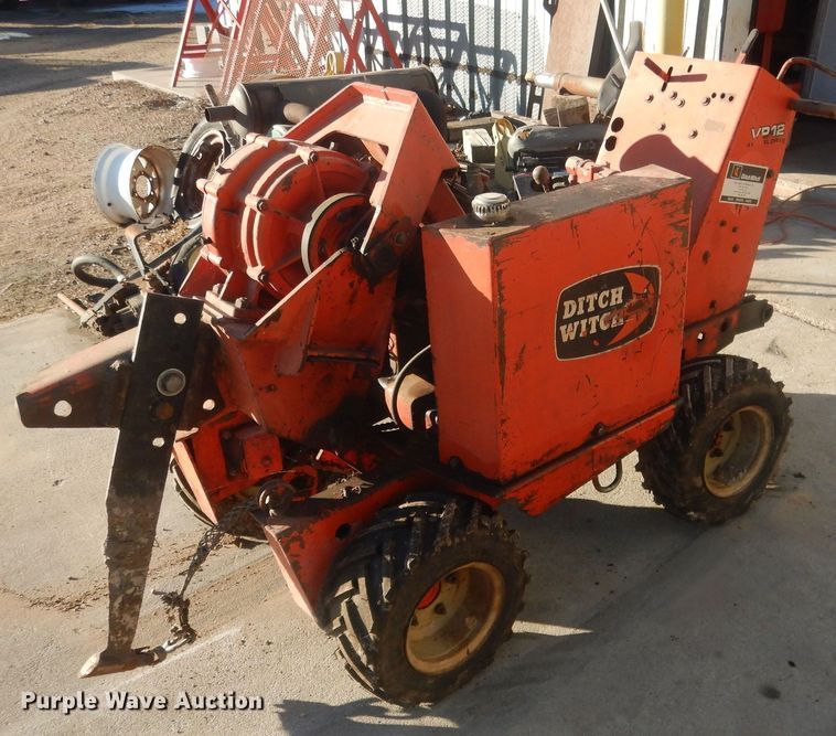 image for item HQ9554 Utility bed trailer with Ditch Witch vibratory plow