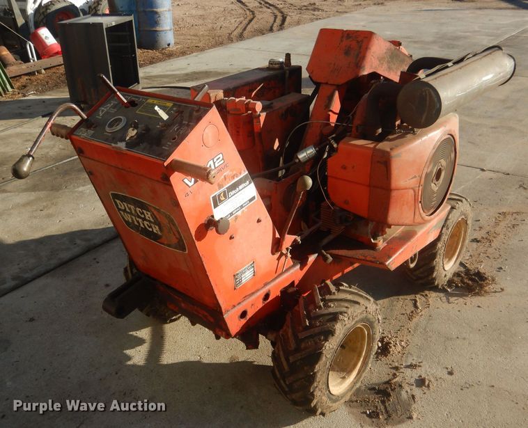 image for item HQ9554 Utility bed trailer with Ditch Witch vibratory plow