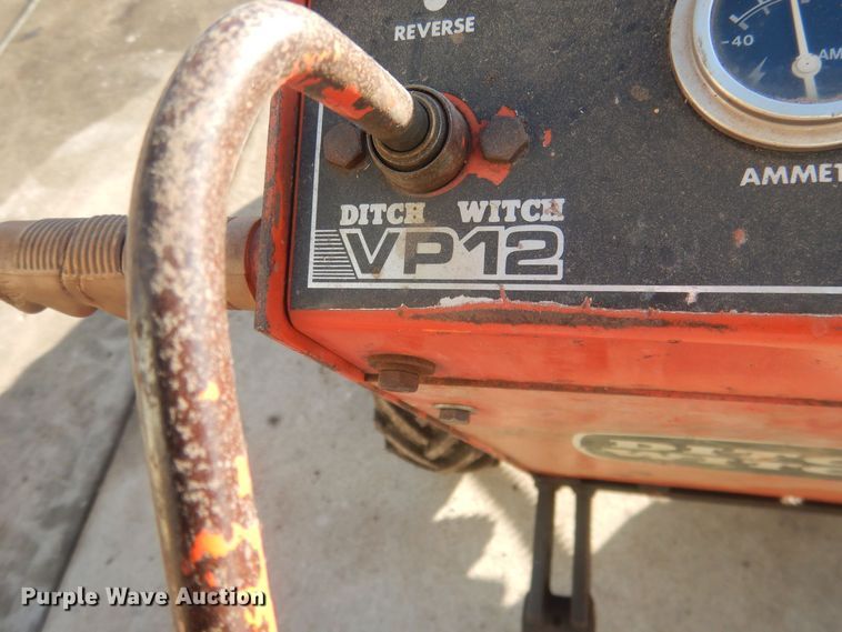 image for item HQ9554 Utility bed trailer with Ditch Witch vibratory plow