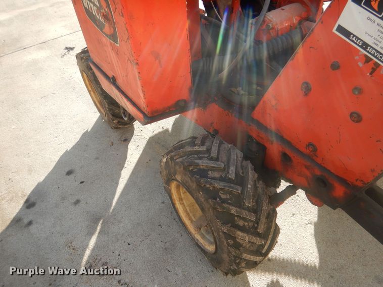 image for item HQ9554 Utility bed trailer with Ditch Witch vibratory plow