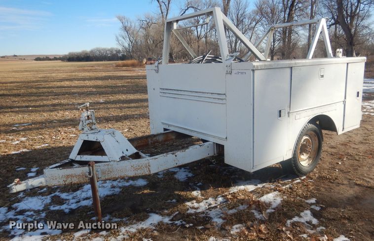 image for item HQ9554 Utility bed trailer with Ditch Witch vibratory plow