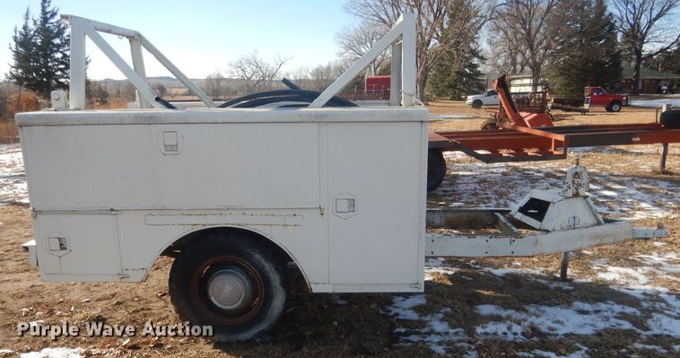 image for item HQ9554 Utility bed trailer with Ditch Witch vibratory plow