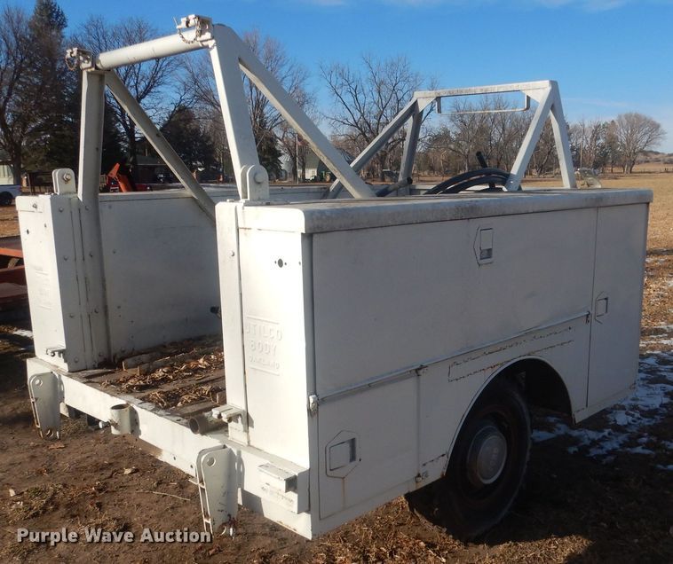 image for item HQ9554 Utility bed trailer with Ditch Witch vibratory plow