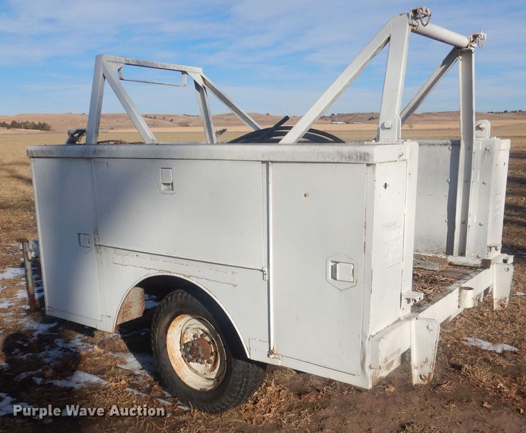 image for item HQ9554 Utility bed trailer with Ditch Witch vibratory plow