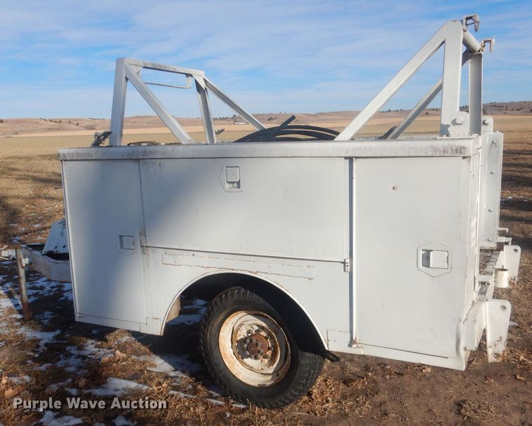 image for item HQ9554 Utility bed trailer with Ditch Witch vibratory plow