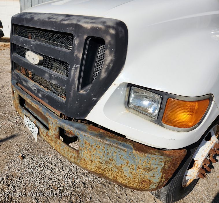 image for item JB9726 2004 Ford F650 Super Duty XL  flatbed truck