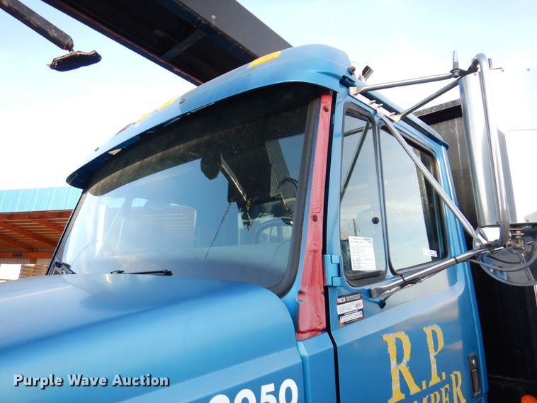 image for item JL9769 2004 Freightliner FL80  flatbed truck