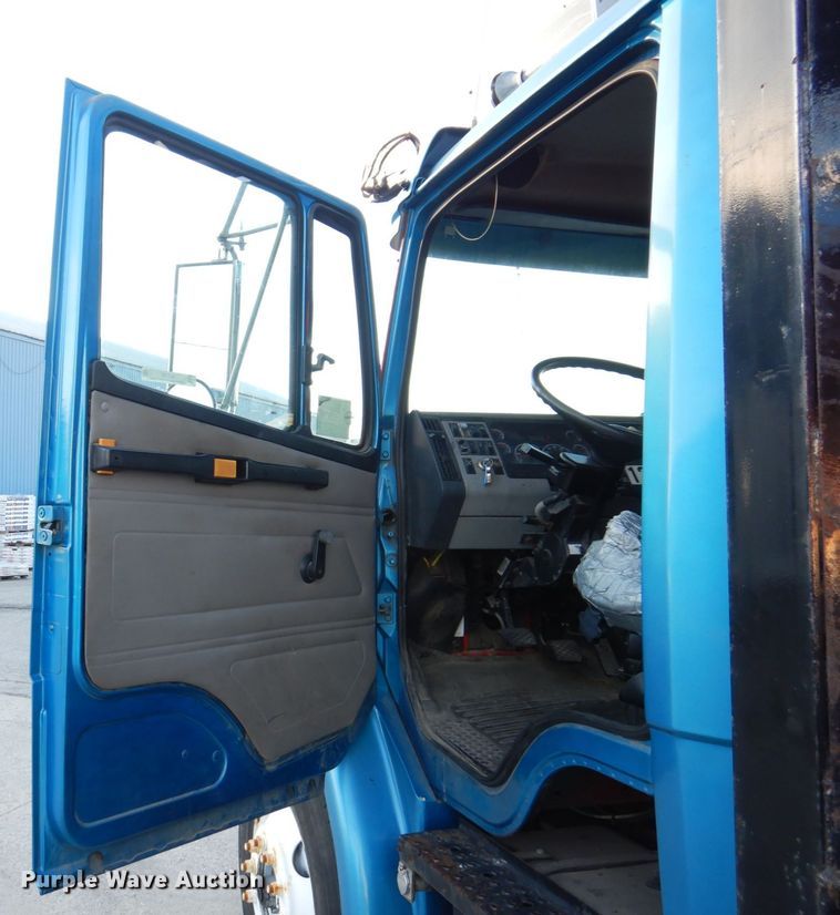 image for item JL9769 2004 Freightliner FL80  flatbed truck