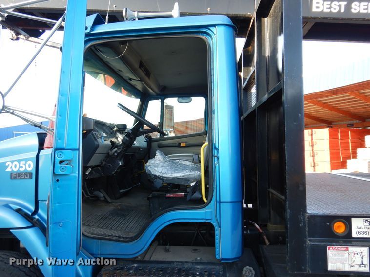 image for item JL9769 2004 Freightliner FL80  flatbed truck