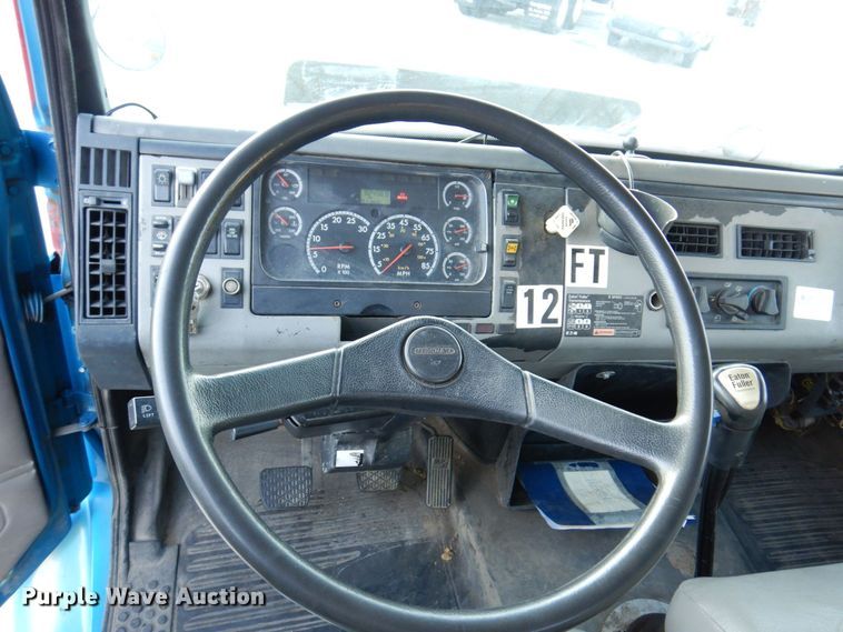 image for item JL9769 2004 Freightliner FL80  flatbed truck