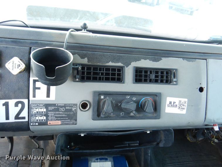 image for item JL9769 2004 Freightliner FL80  flatbed truck