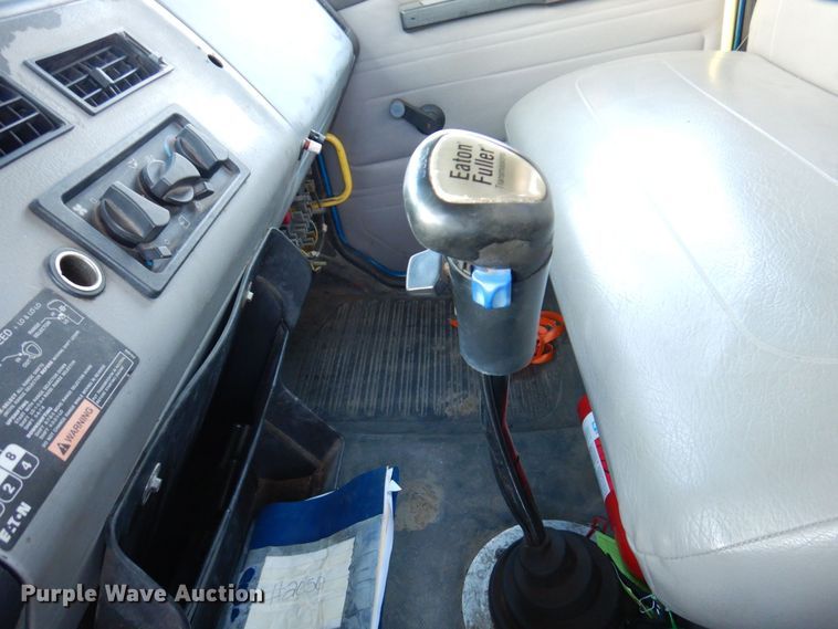 image for item JL9769 2004 Freightliner FL80  flatbed truck