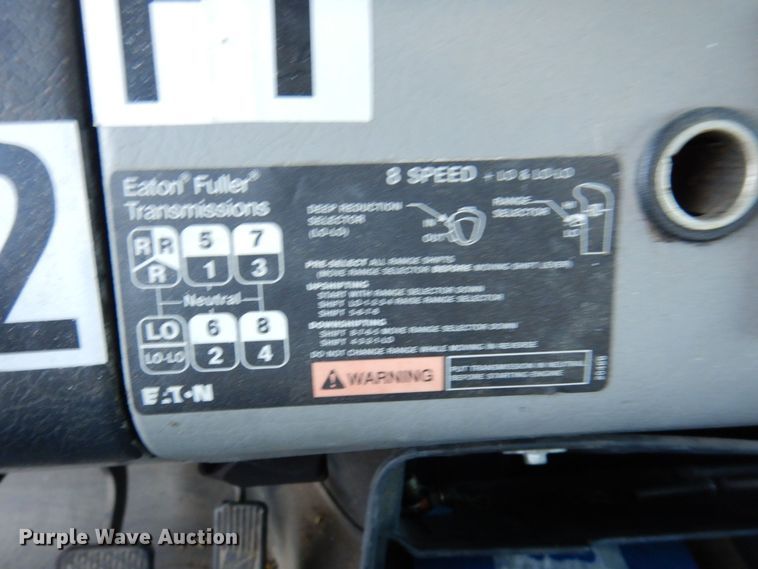 image for item JL9769 2004 Freightliner FL80  flatbed truck