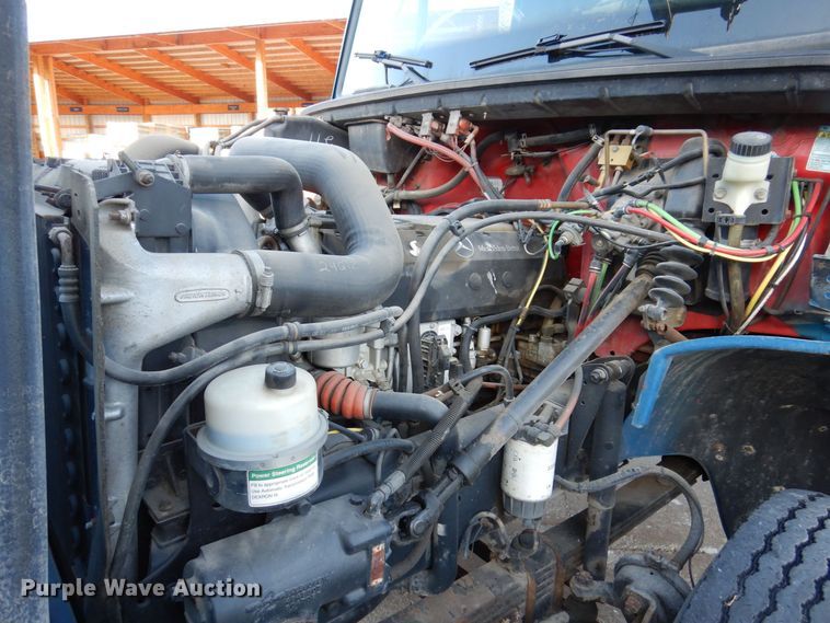 image for item JL9769 2004 Freightliner FL80  flatbed truck