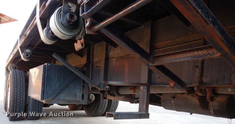 image for item JL9769 2004 Freightliner FL80  flatbed truck