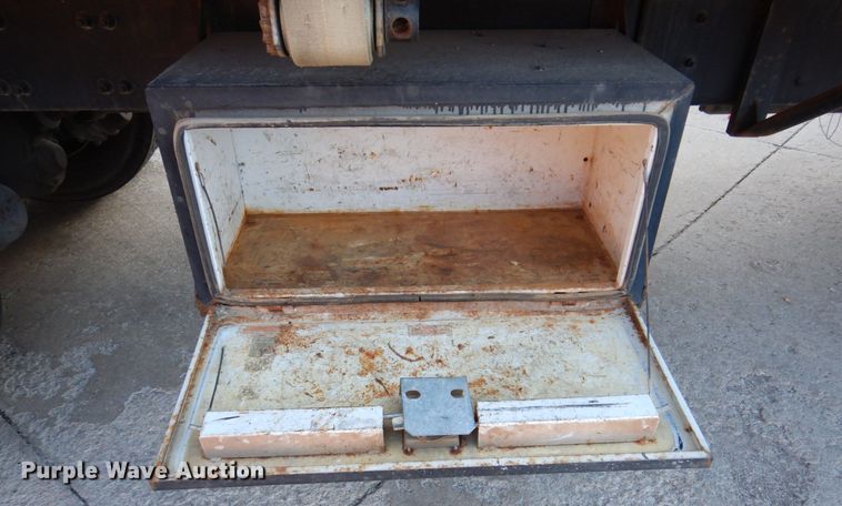 image for item JL9769 2004 Freightliner FL80  flatbed truck