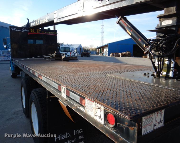 image for item JL9769 2004 Freightliner FL80  flatbed truck