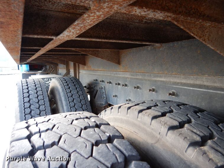 image for item JL9769 2004 Freightliner FL80  flatbed truck