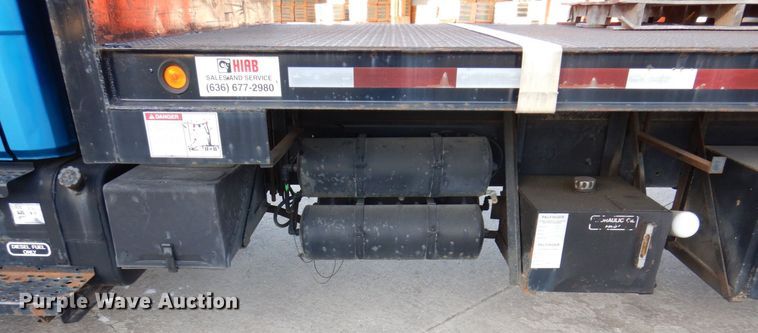 image for item JL9769 2004 Freightliner FL80  flatbed truck