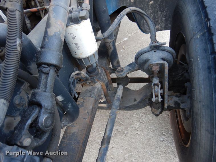 image for item JL9769 2004 Freightliner FL80  flatbed truck