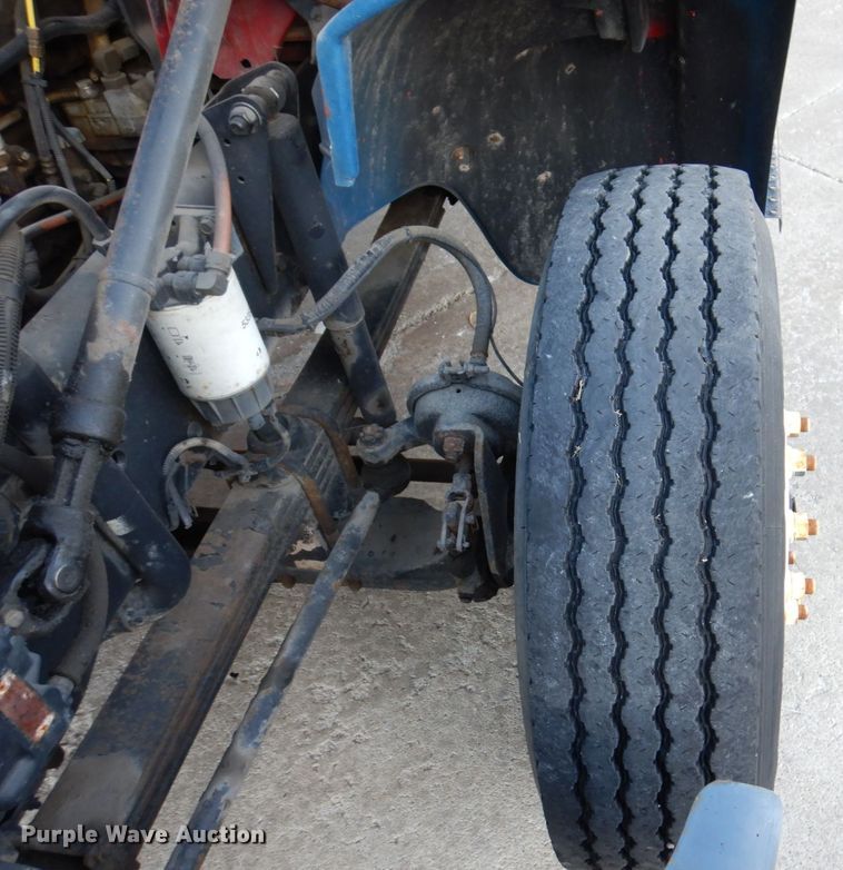 image for item JL9769 2004 Freightliner FL80  flatbed truck