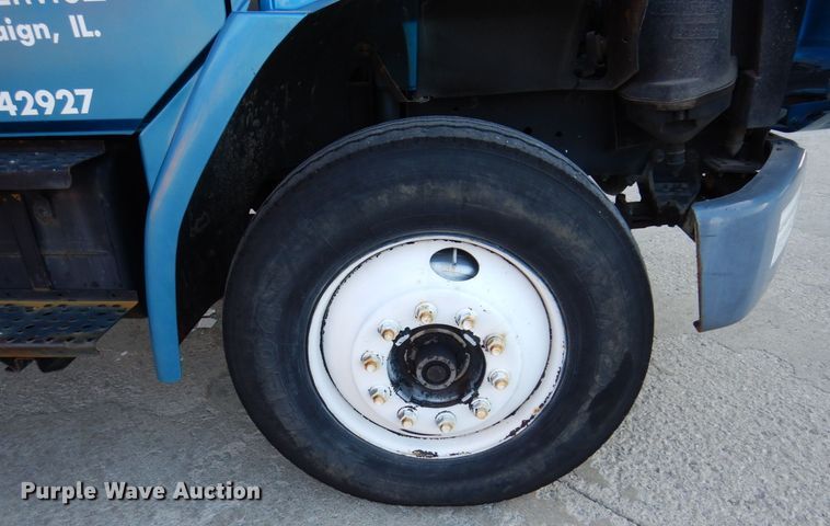 image for item JL9769 2004 Freightliner FL80  flatbed truck