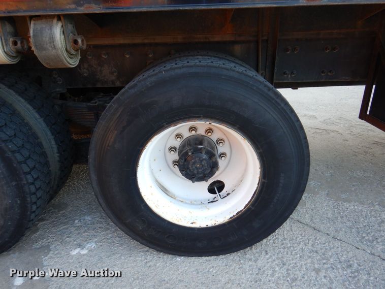 image for item JL9769 2004 Freightliner FL80  flatbed truck