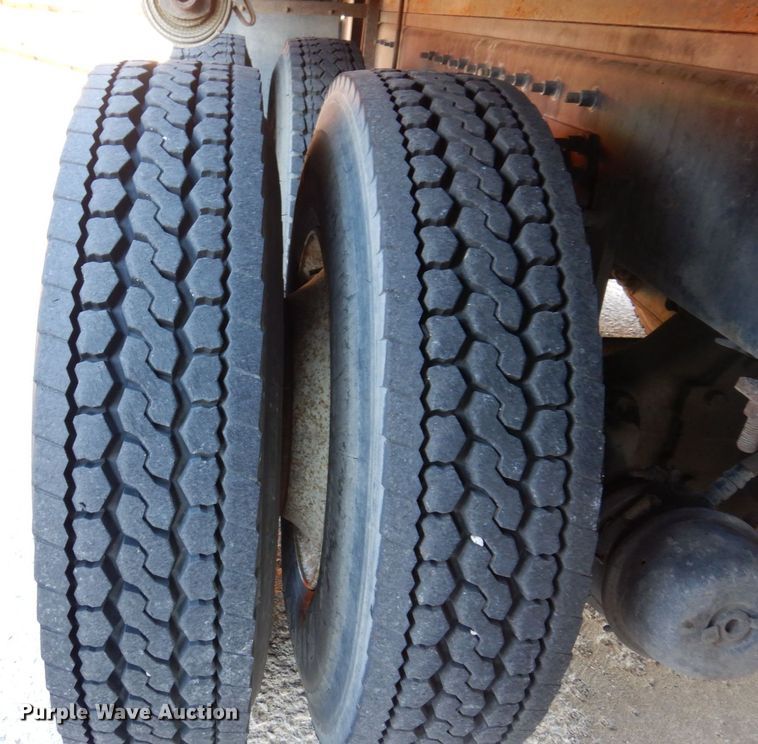 image for item JL9769 2004 Freightliner FL80  flatbed truck